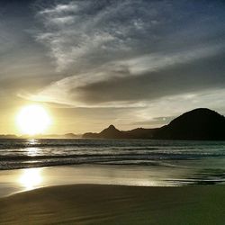 Scenic view of sea at sunset