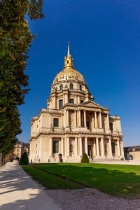 View of historical building against clear blue sky