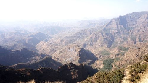 Aerial view of landscape and mountains against sky