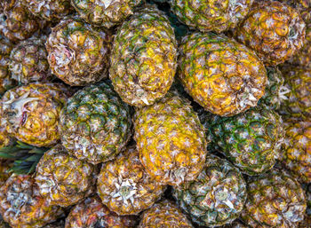 Full frame shot of pineapples for sale in market