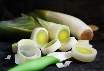 Close-up of chopped vegetables on table