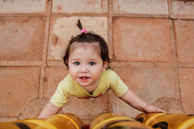 Portrait of cute girl standing outdoors