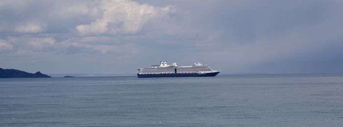 Ship in sea against sky