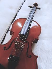 Close-up of a guitar on stage