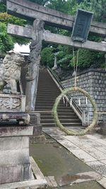 Statue of staircase by canal