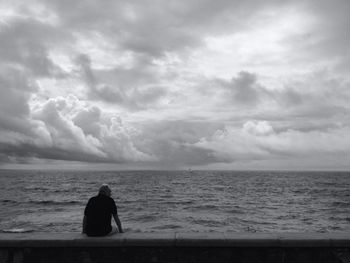 Scenic view of sea against cloudy sky