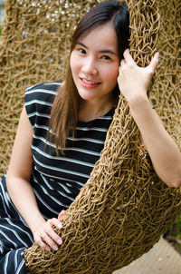 Portrait of smiling young woman