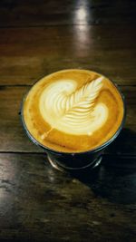 Close-up of cappuccino on table