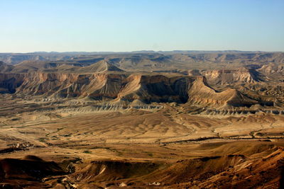 Aerial view of mountains at desert against sky