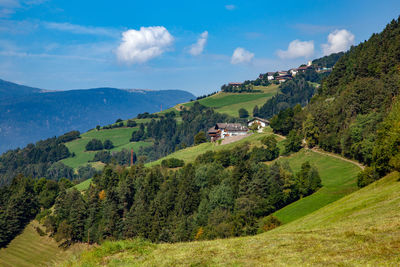 Scenic view of landscape and mountains against sky