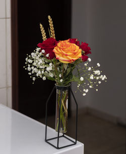 Close-up of flower vase on table