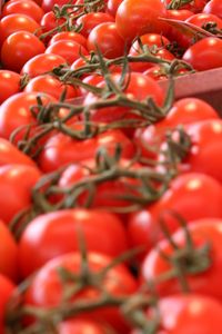 Full frame shot of fresh tomatoes for sale at market stall