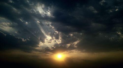 Scenic view of dramatic sky during sunset