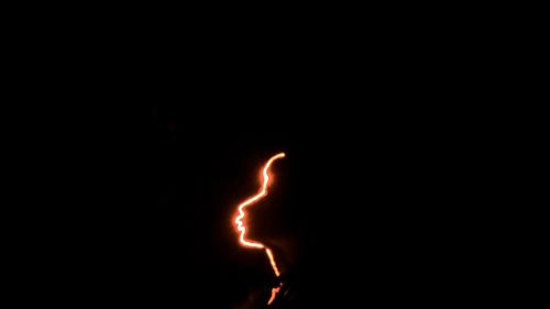Fire crackers over black background