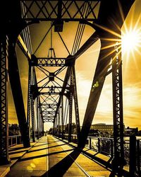 Bridge against sky at sunset