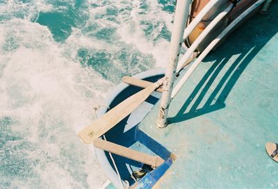 High angle view of chair on beach