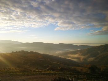 Scenic view of landscape against sky during sunset