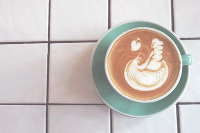 Directly above shot of cappuccino on table