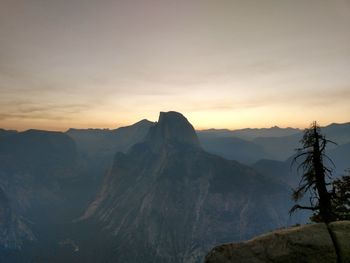 Scenic view of mountains against sky during sunset