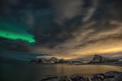 Scenic view of sea against sky at night