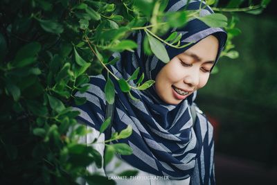 Happy boy looking at plants