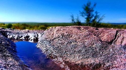 Rock formations against blue sky