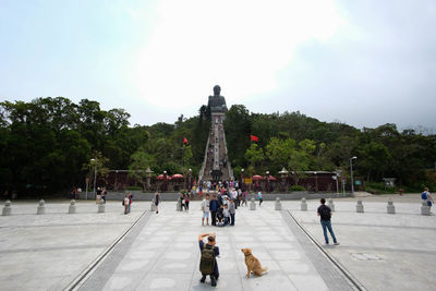 Group of people in front of historical building