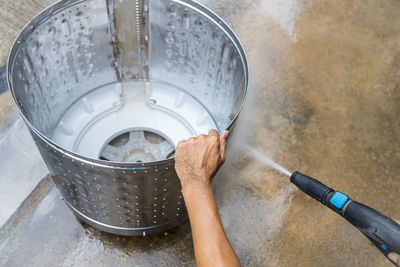 High angle view of person working in water