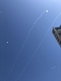 Low angle view of vapor trail in sky