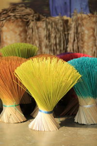 Colorful incense sticks on floor