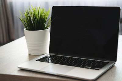 Close-up of laptop on table