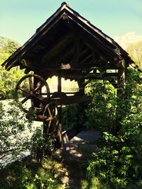 Low angle view of built structure against trees