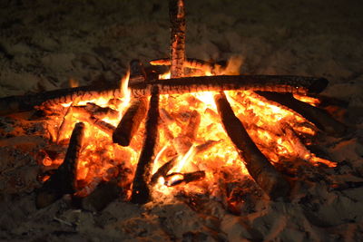 High angle view of bonfire on fire at night