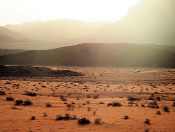 Scenic view of desert against sky