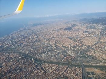 Aerial view of cityscape against sky
