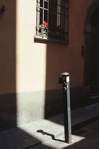 Street light against building