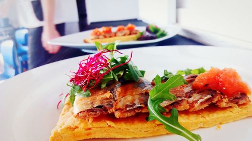 Close-up of sardine served in plate