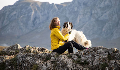 View of a dog on rock