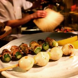 Close-up of man preparing food