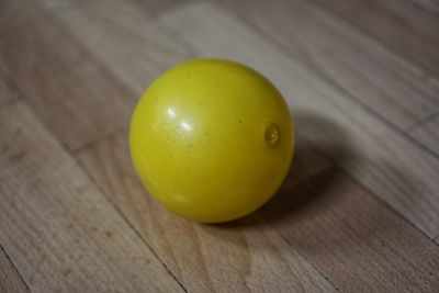 Close-up of yellow fruit on table