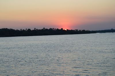 Scenic view of sea at sunset