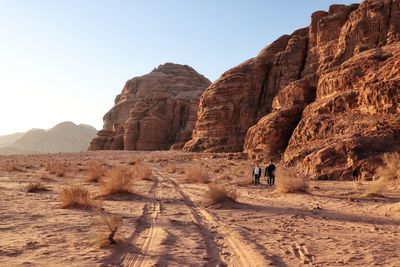 Rock formations in desert against sky