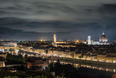 High angle view of illuminated buildings in city