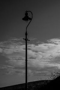 Low angle view of street light against sky