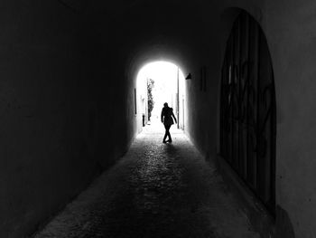 People walking in tunnel