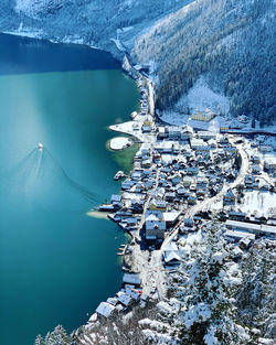 High angle view of boats in sea during winter at hallstatt austria 