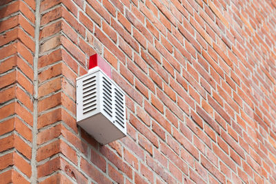 Alarm system on a brick wall