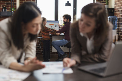 Business colleagues working at office