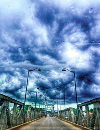 View of road against cloudy sky