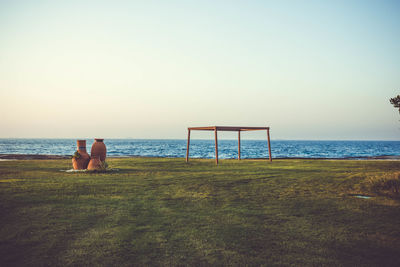 Scenic view of sea against clear sky